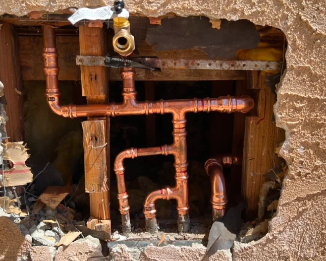 plumbing system inside wall