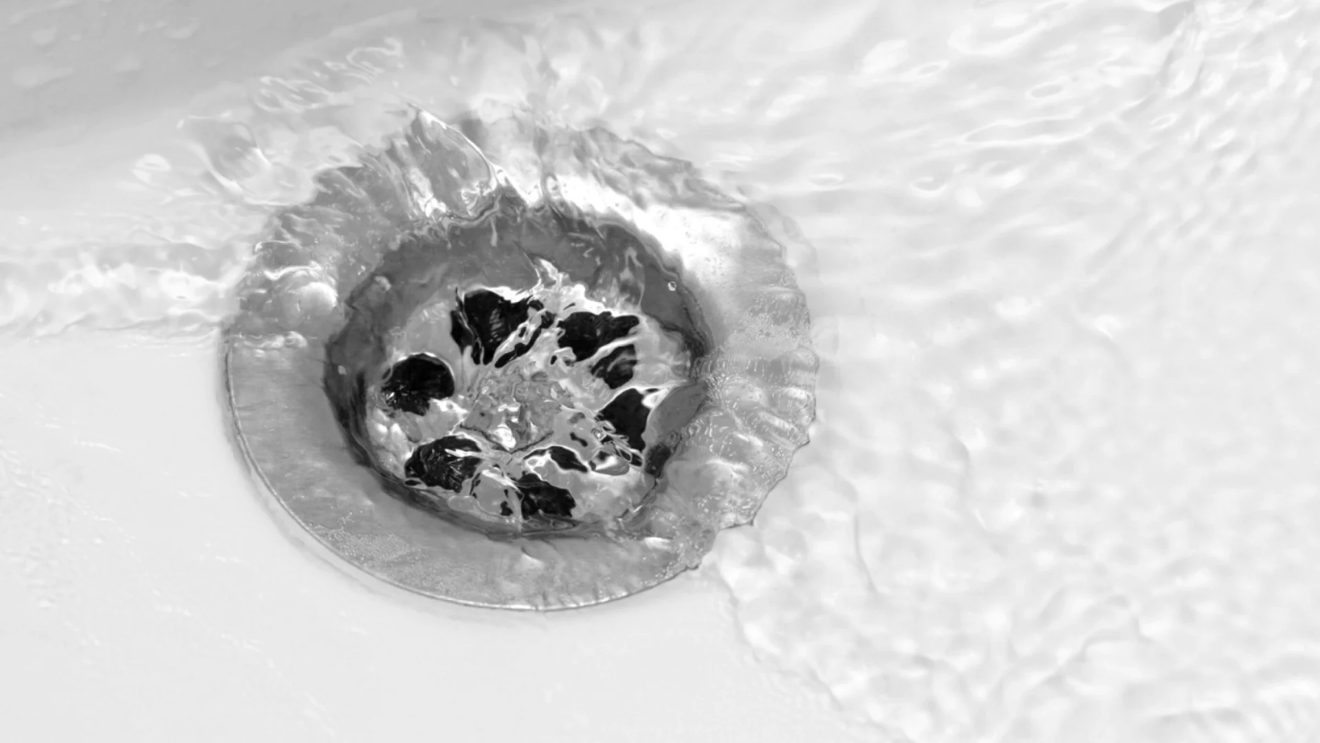 water drain with flowing water